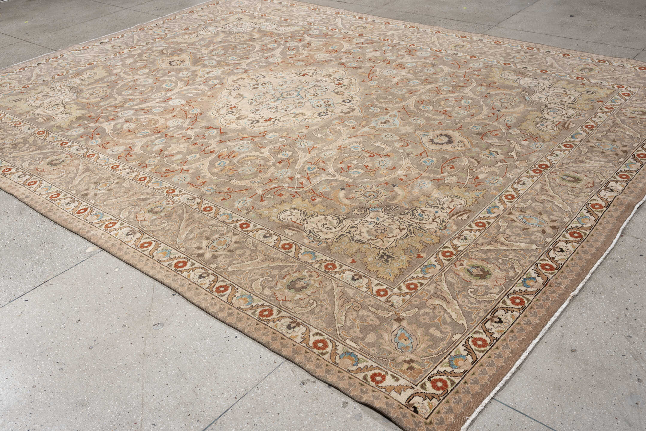 9' x 12' one-of-a-kind handmade vintage Tabriz large size rug. Color palette: taupe, ivory, camel, pale blue, rust, cream