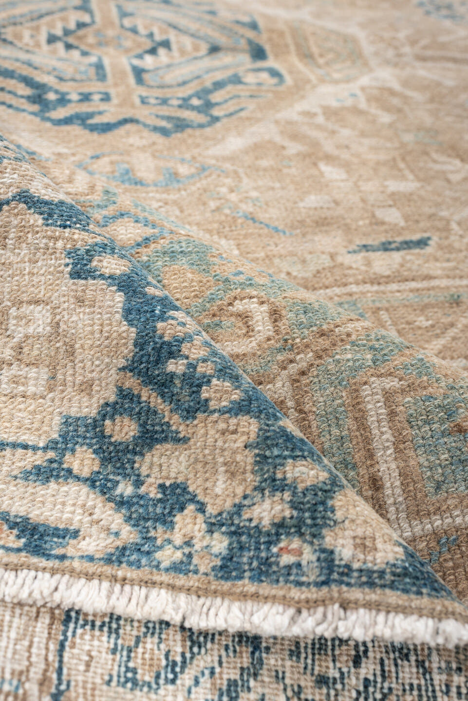 4' x 6' one-of-a-kind handmade antique Karaje rug. Color palette: camel, blue gray, ivory, taupe, slate, beige, gray, blue