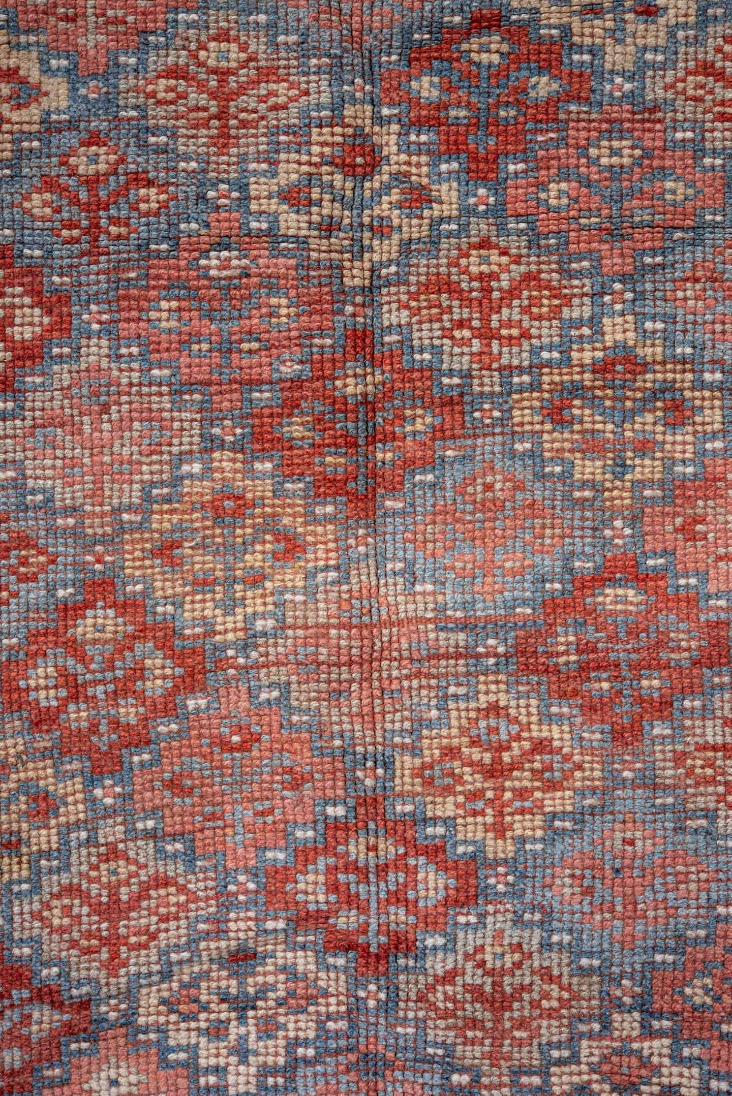 5' x 7' one-of-a-kind handmade antique Kurd rug. Color palette: coral, dusty blue, ivory, rust, rose, taupe, terracotta