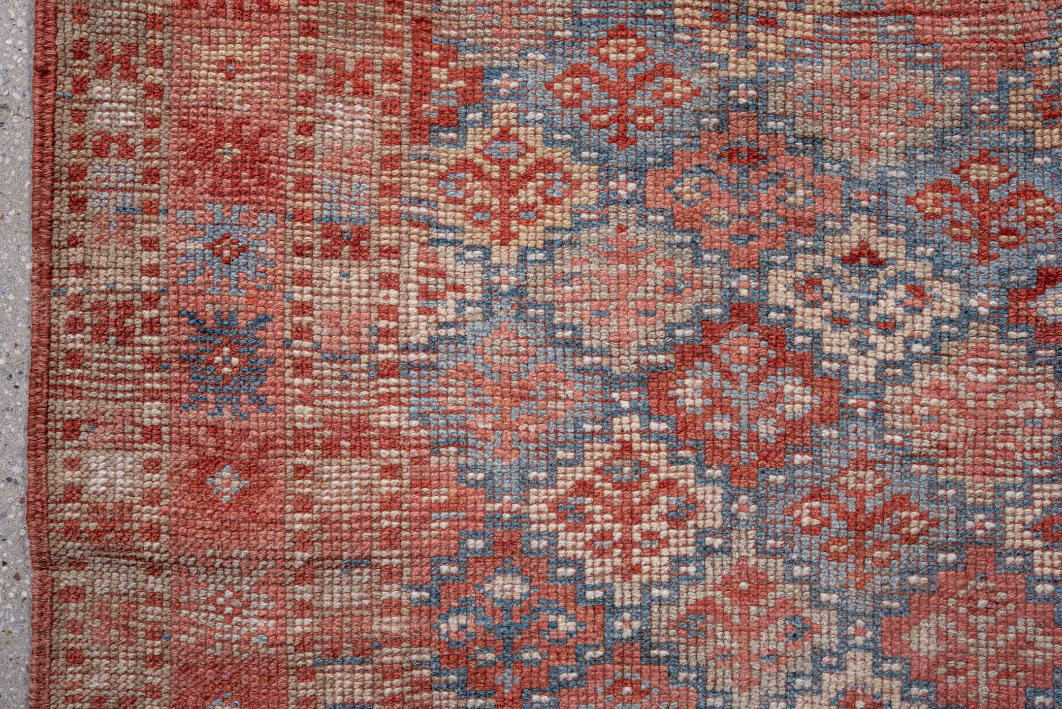 5' x 7' one-of-a-kind handmade antique Kurd rug. Color palette: coral, dusty blue, ivory, rust, rose, taupe, terracotta