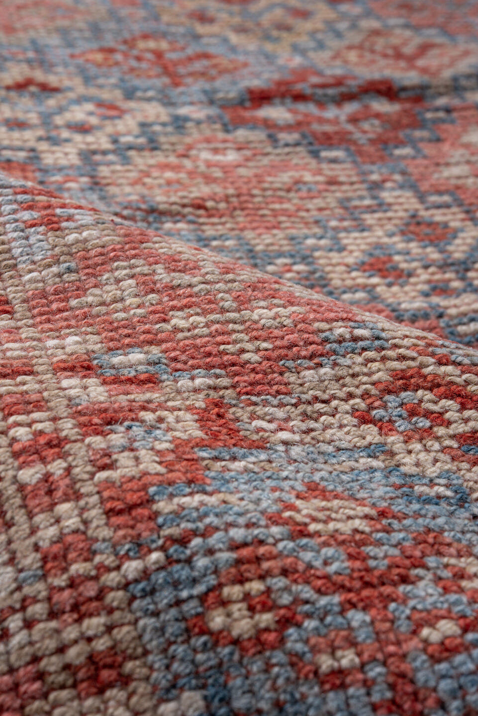 5' x 7' one-of-a-kind handmade antique Kurd rug. Color palette: coral, dusty blue, ivory, rust, rose, taupe, terracotta