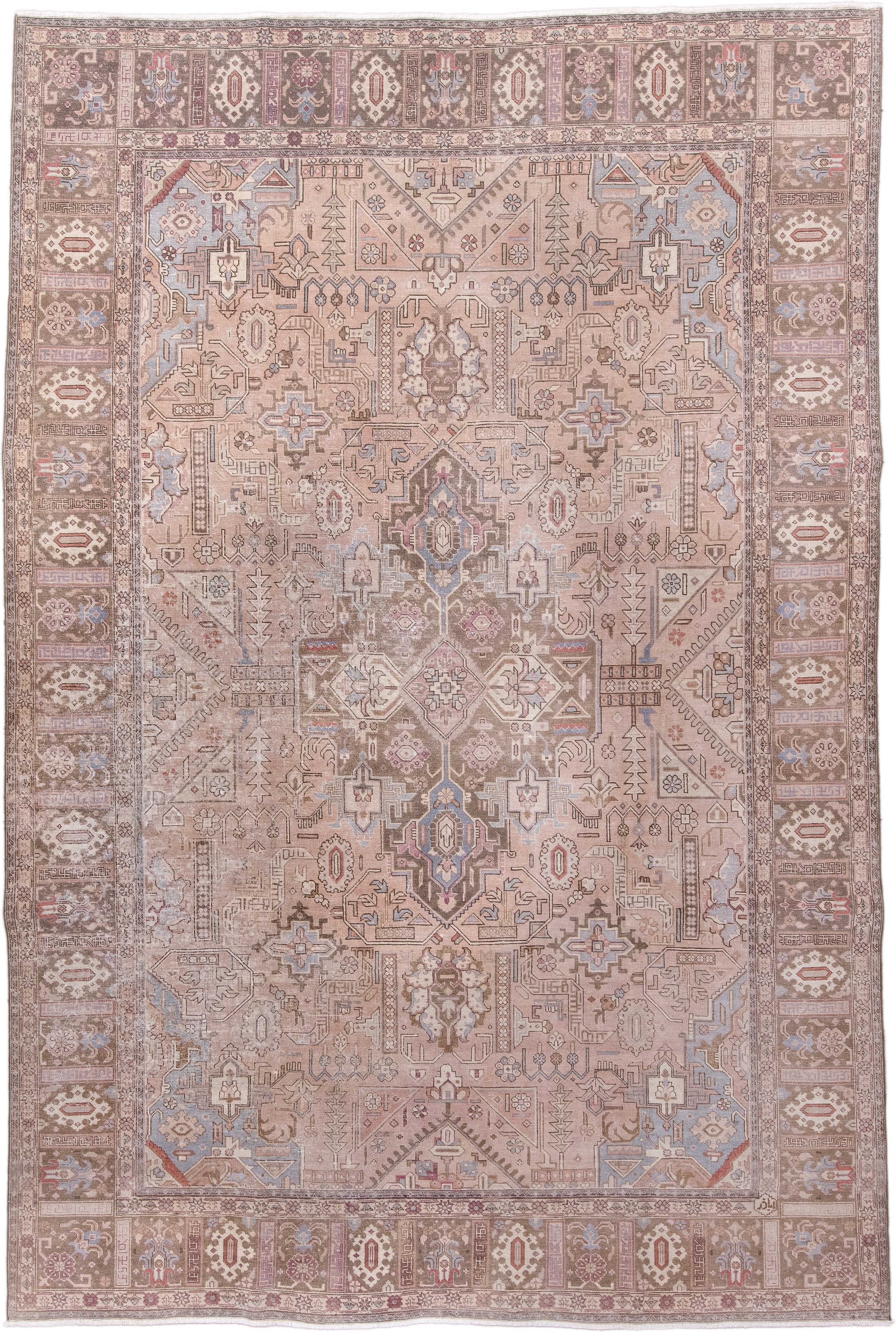 7' x 11' one-of-a-kind handmade antique Heriz large size rug. Color palette: taupe, rose, dusty blue, ivory, brown