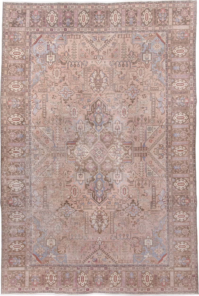 7' x 11' one-of-a-kind handmade antique Heriz large size rug. Color palette: taupe, rose, dusty blue, ivory, brown