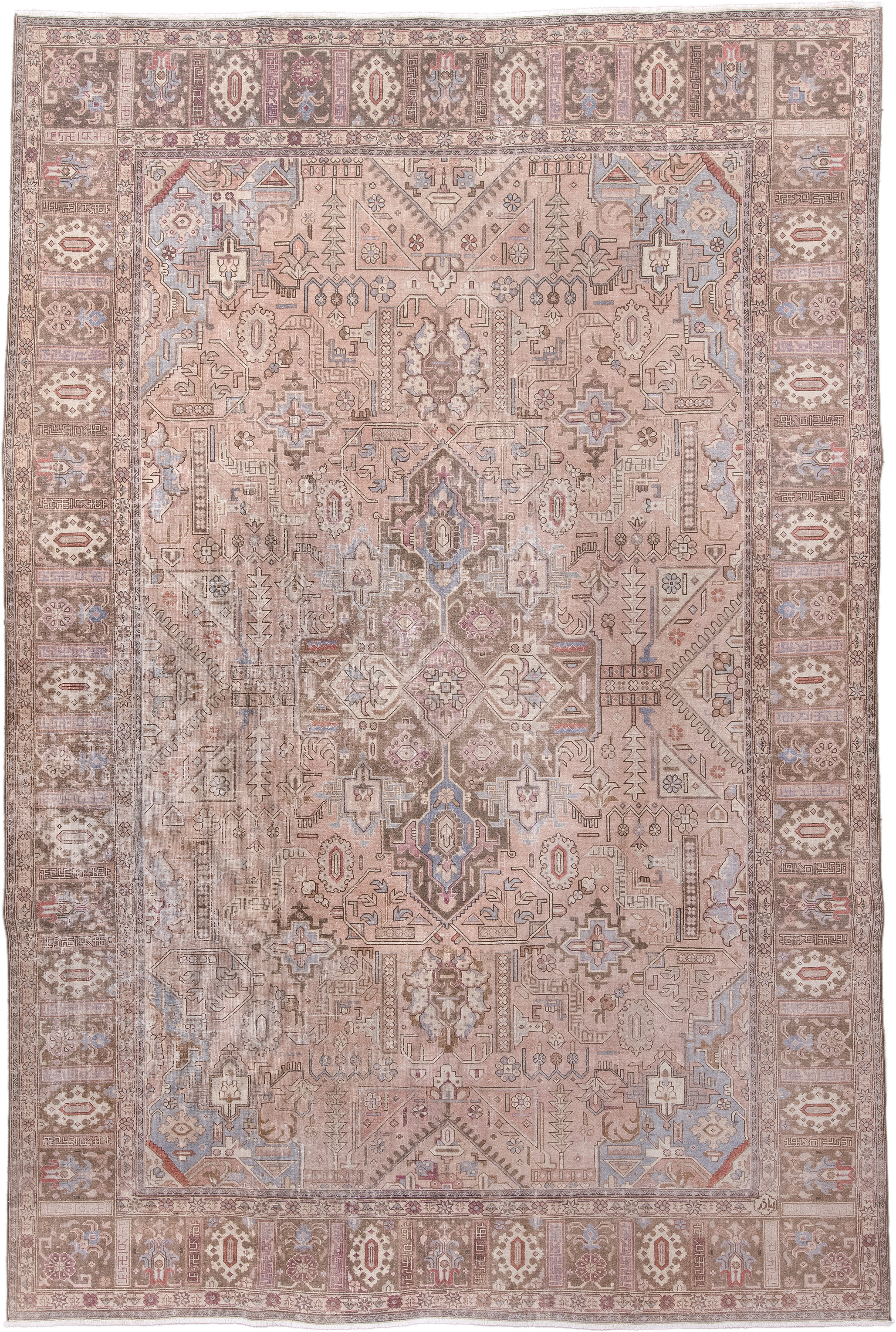 7' x 11' one-of-a-kind handmade antique Heriz large size rug. Color palette: taupe, rose, dusty blue, ivory, brown