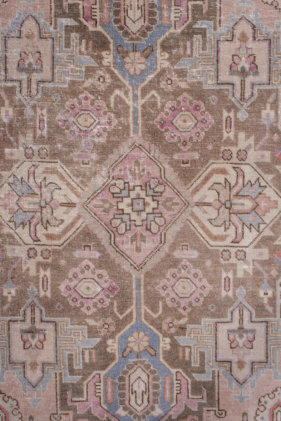 7' x 11' one-of-a-kind handmade antique Heriz large size rug. Color palette: taupe, rose, dusty blue, ivory, brown