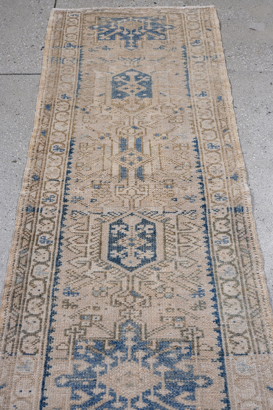 1' x 5' one-of-a-kind handmade antique Karaje small size rug. Color palette: ivory, beige, sky blue, taupe, camel