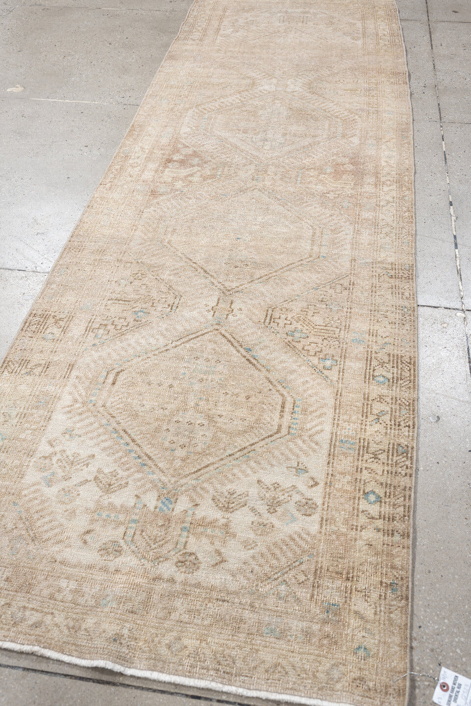 3' x 10' one-of-a-kind handmade antique Sarab runner rug. Color palette: ivory, beige, taupe, camel, pale blue, light brown