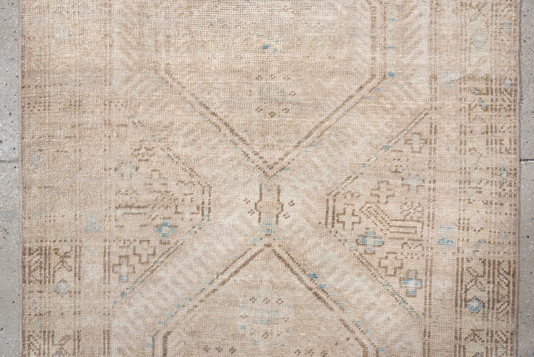 3' x 10' one-of-a-kind handmade antique Sarab runner rug. Color palette: ivory, beige, taupe, camel, pale blue, light brown