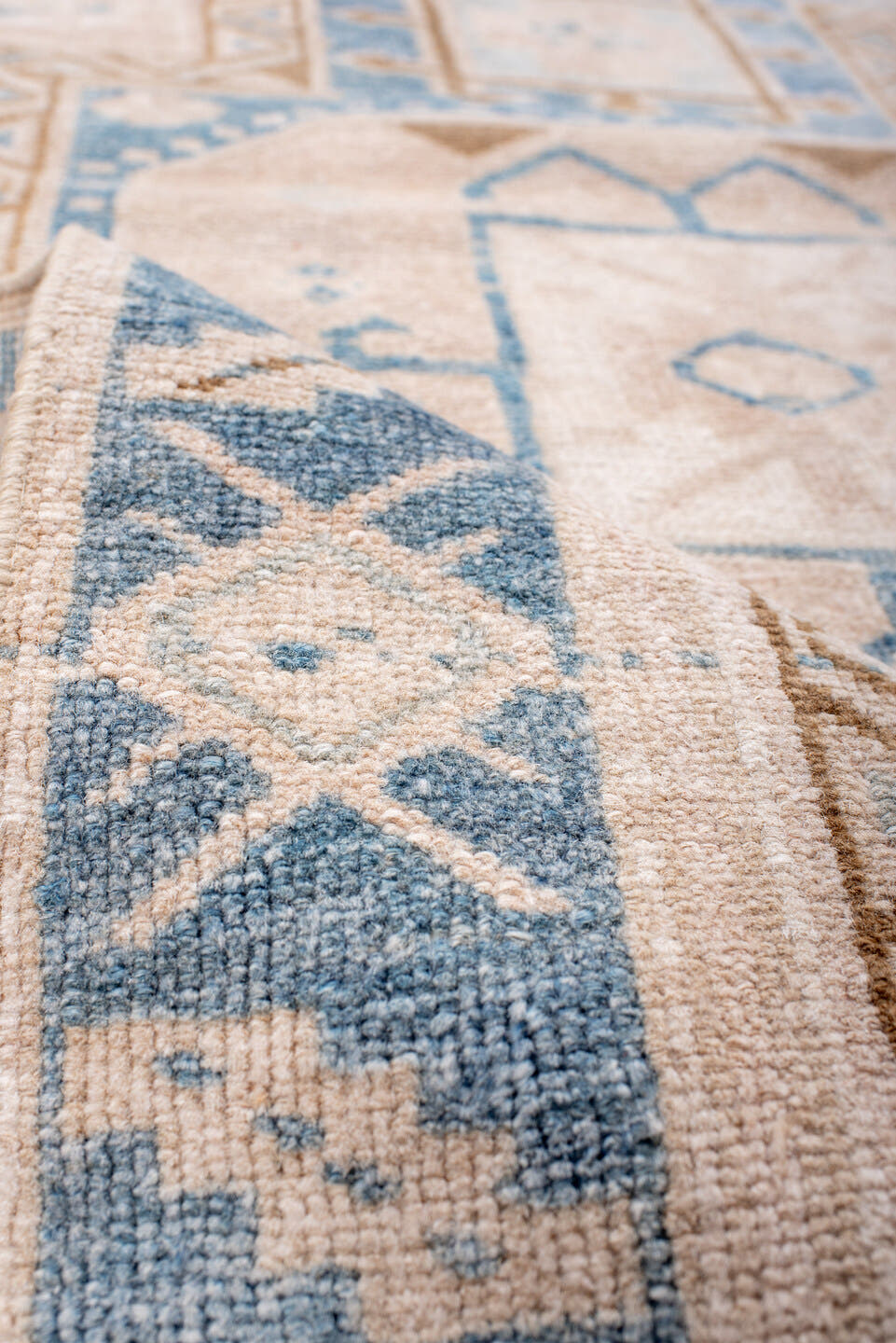 2' x 10' one-of-a-kind handmade antique Heriz runner rug. Color palette: ivory, sky blue, camel, light blue, taupe, brown