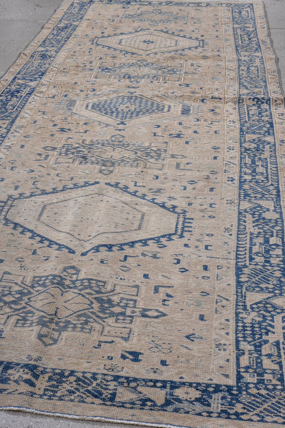 4' x 12' one-of-a-kind handmade antique Karaje runner rug. Color palette: ivory, indigo, slate, taupe, cream, purple, gray