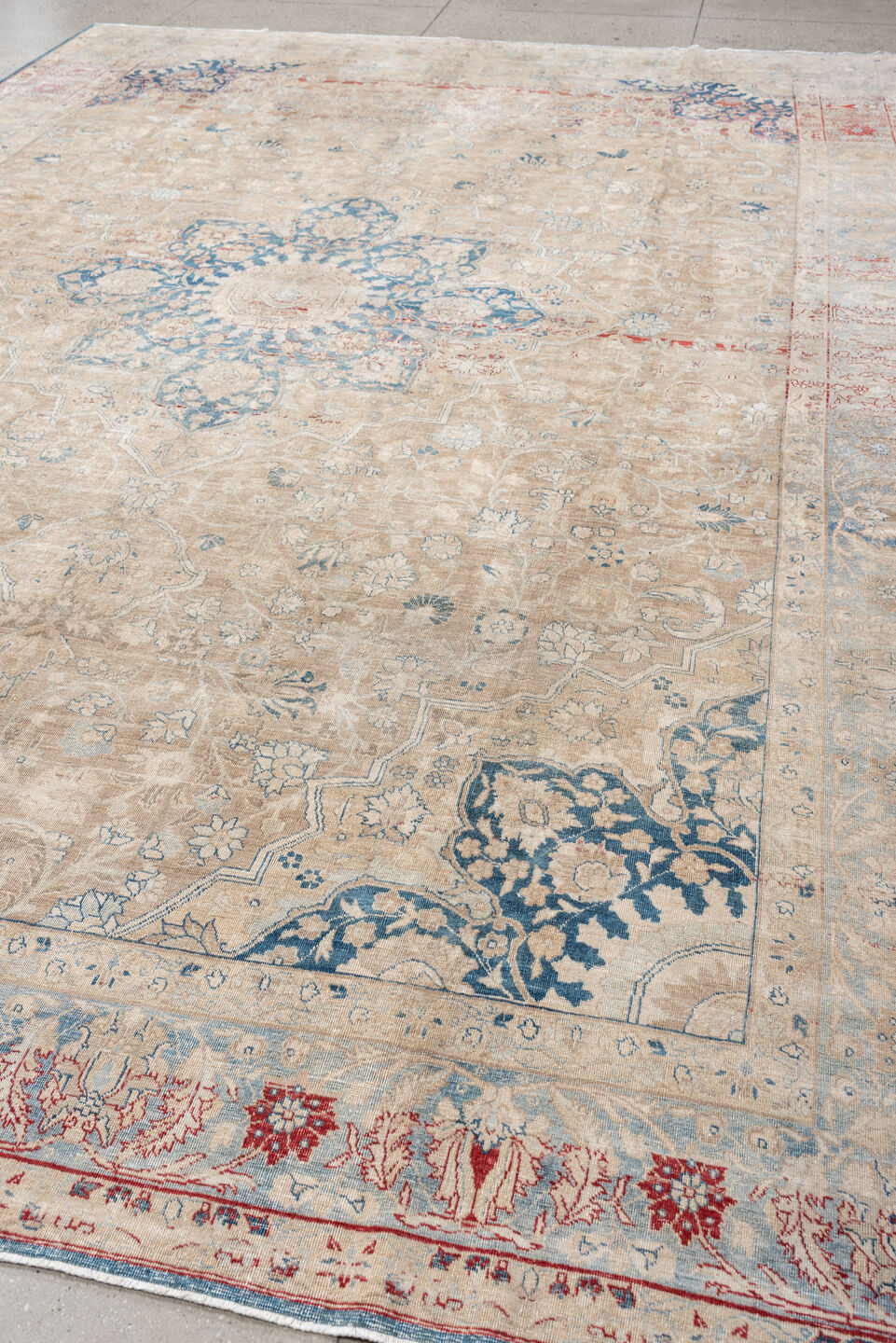 9' x 13' one-of-a-kind handmade vintage Tabriz large size rug. Color palette: ivory, pale blue, beige, muted terracotta