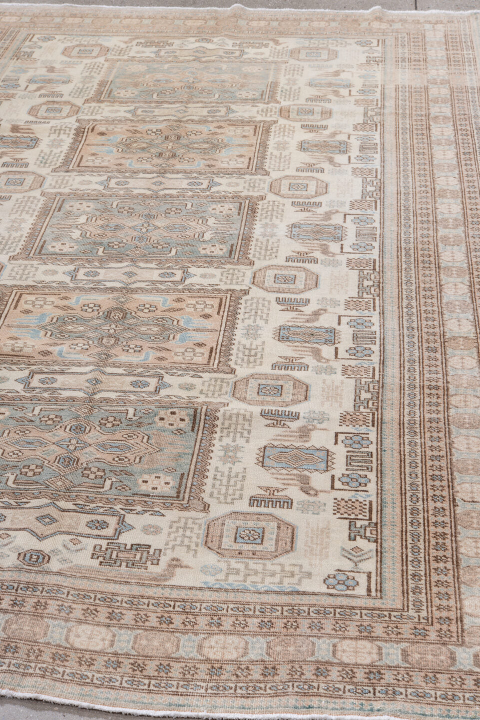 5' x 8' one-of-a-kind handmade antique Ardebil medium size rug. Color palette: ivory, taupe, sand, pale blue, camel, beige