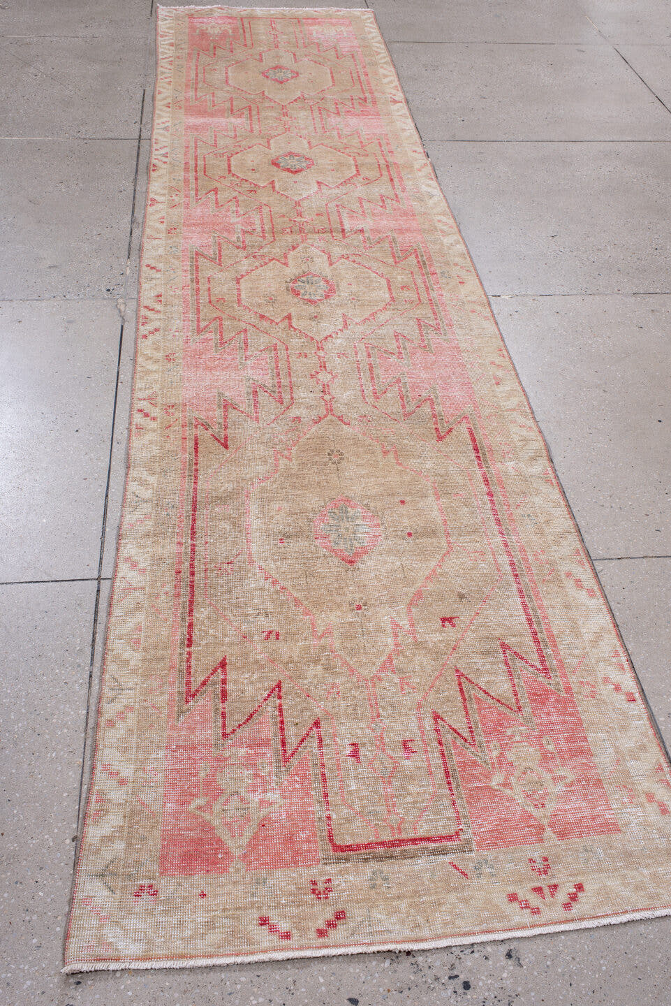 3' x 13' one-of-a-kind handmade vintage Sarab runner rug. Color palette: blush, ivory, beige, rose, taupe, faded red