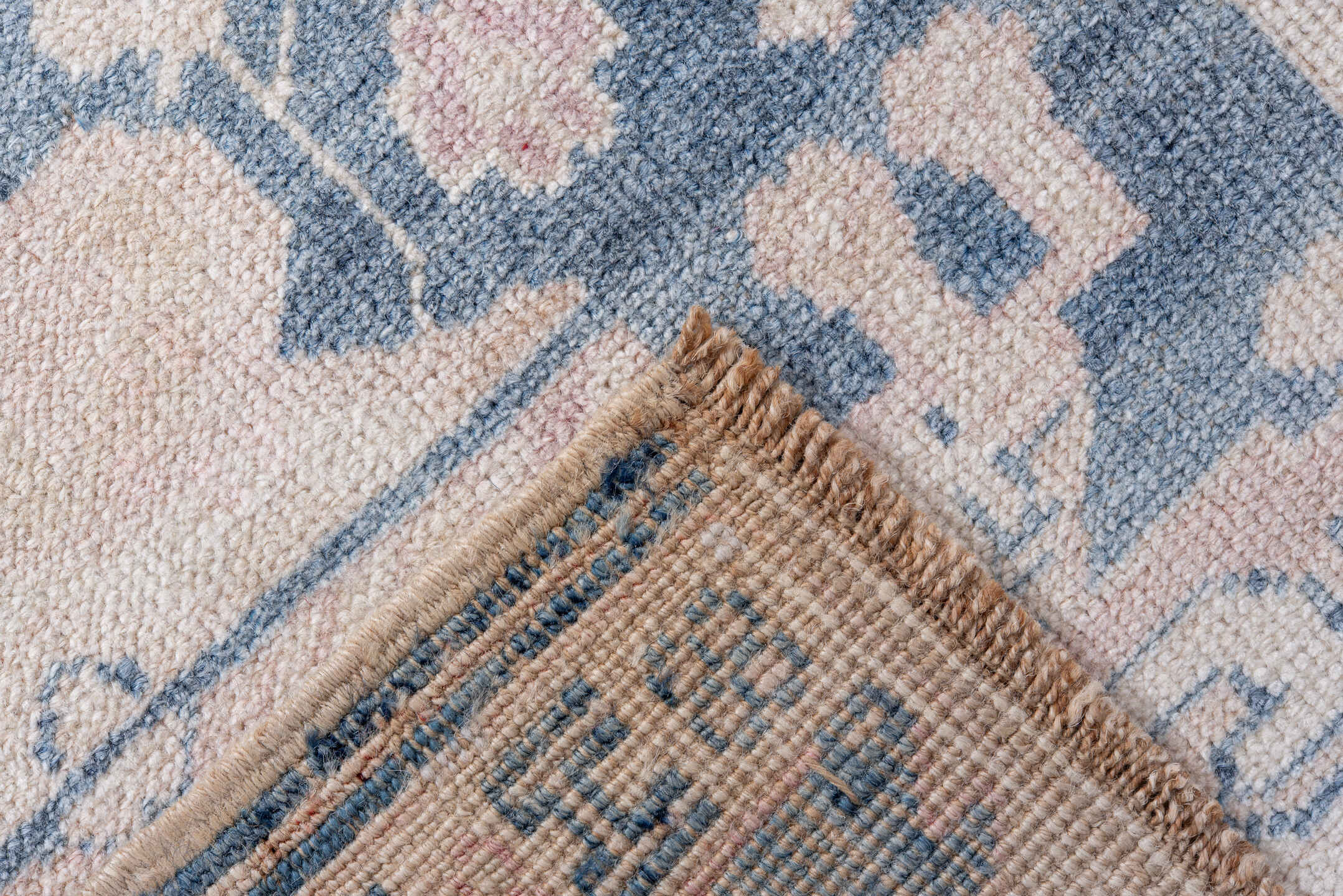 2' x 9' one-of-a-kind handmade antique Anatolian runner rug. Color palette: ivory, pale blue, blush, slate, cream
