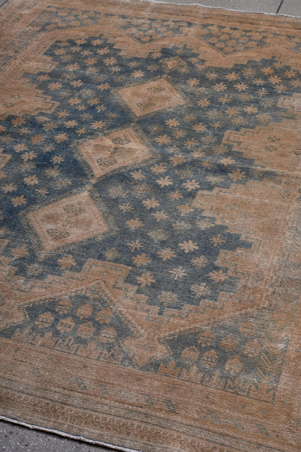 5' x 7' one-of-a-kind handmade antique Afshar rug. Color palette: camel, blue, sand, taupe, ivory, slate, beige, gray