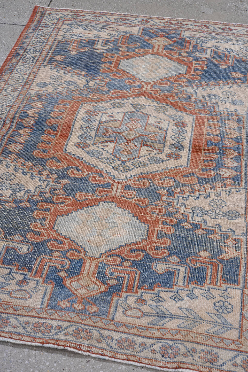 3' x 5' one-of-a-kind handmade antique Veece small size rug. Color palette: ivory, blue, rust, light blue, terra cotta