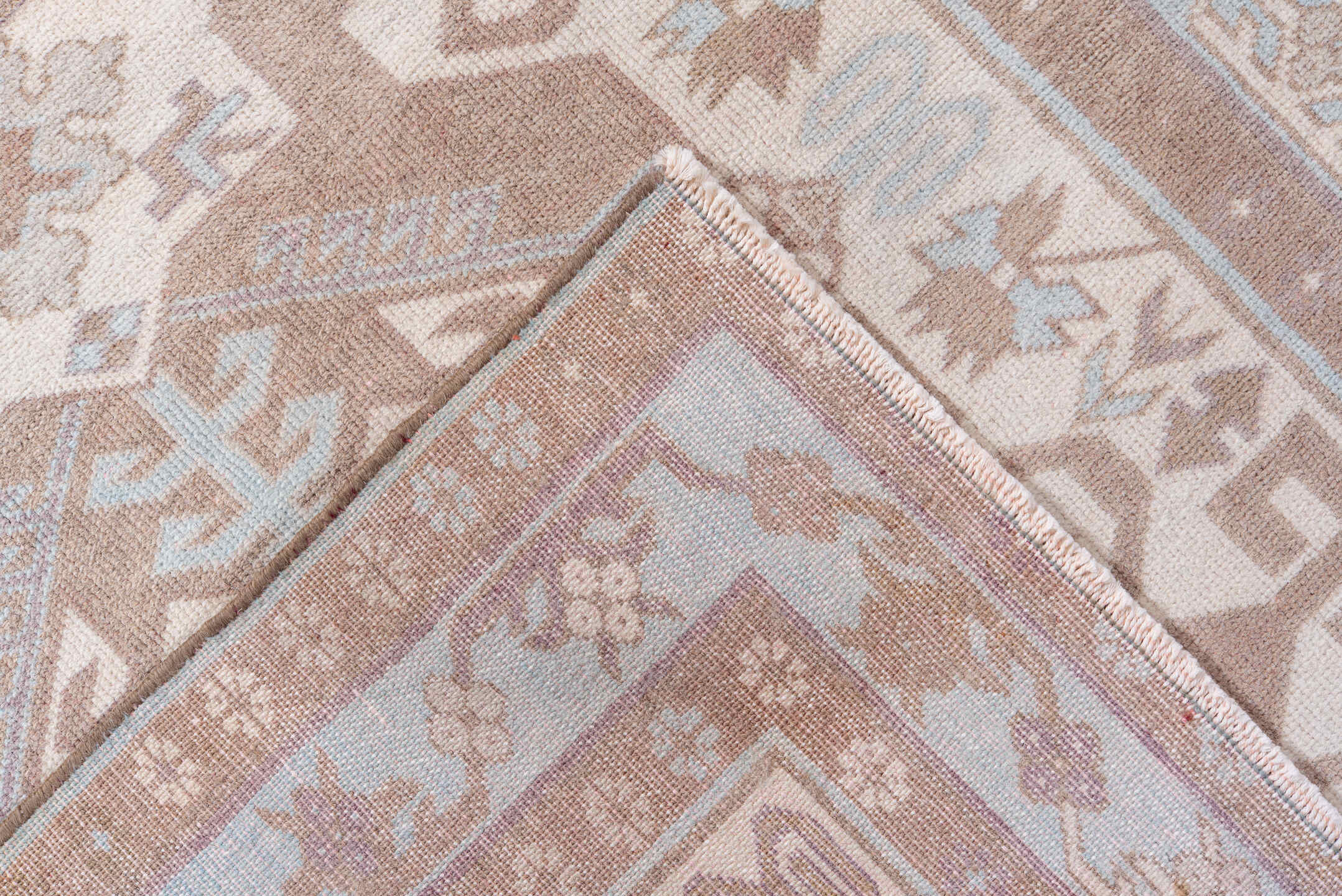2' x 9' one-of-a-kind handmade antique Sivas runner rug. Color palette: blush, ivory, pale blue, taupe, camel, pink