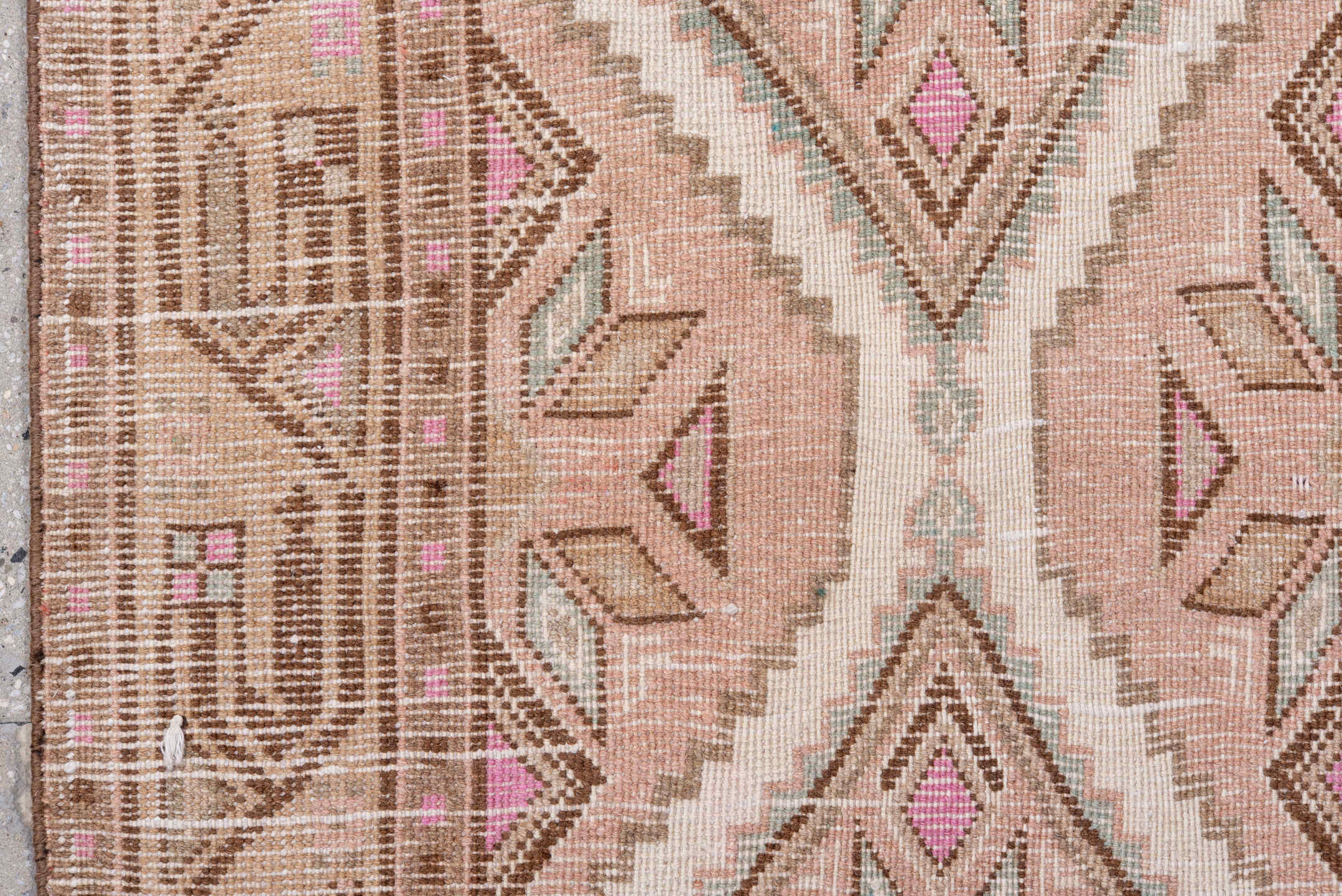 2' x 9' one-of-a-kind handmade vintage Sarab runner rug. Color palette: brown, gray, light gray, misty rose, off-white, pink