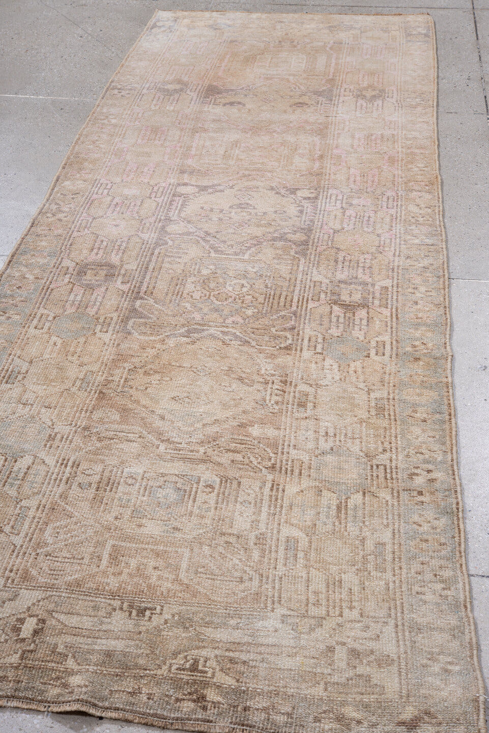 3' x 10' one-of-a-kind handmade vintage Sarab runner rug. Color palette: blush, ivory, taupe, pale blue, beige, sand, camel