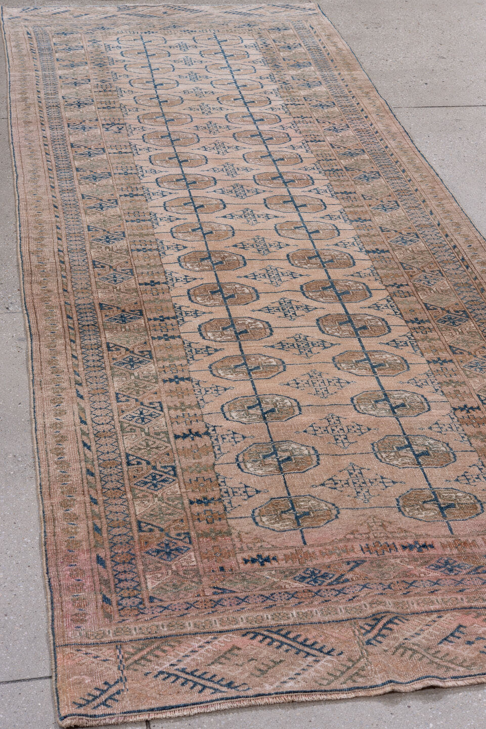3' x 9' one-of-a-kind handmade antique Bokara runner rug. Color palette: taupe, dusty rose, slate, ivory, camel, brown