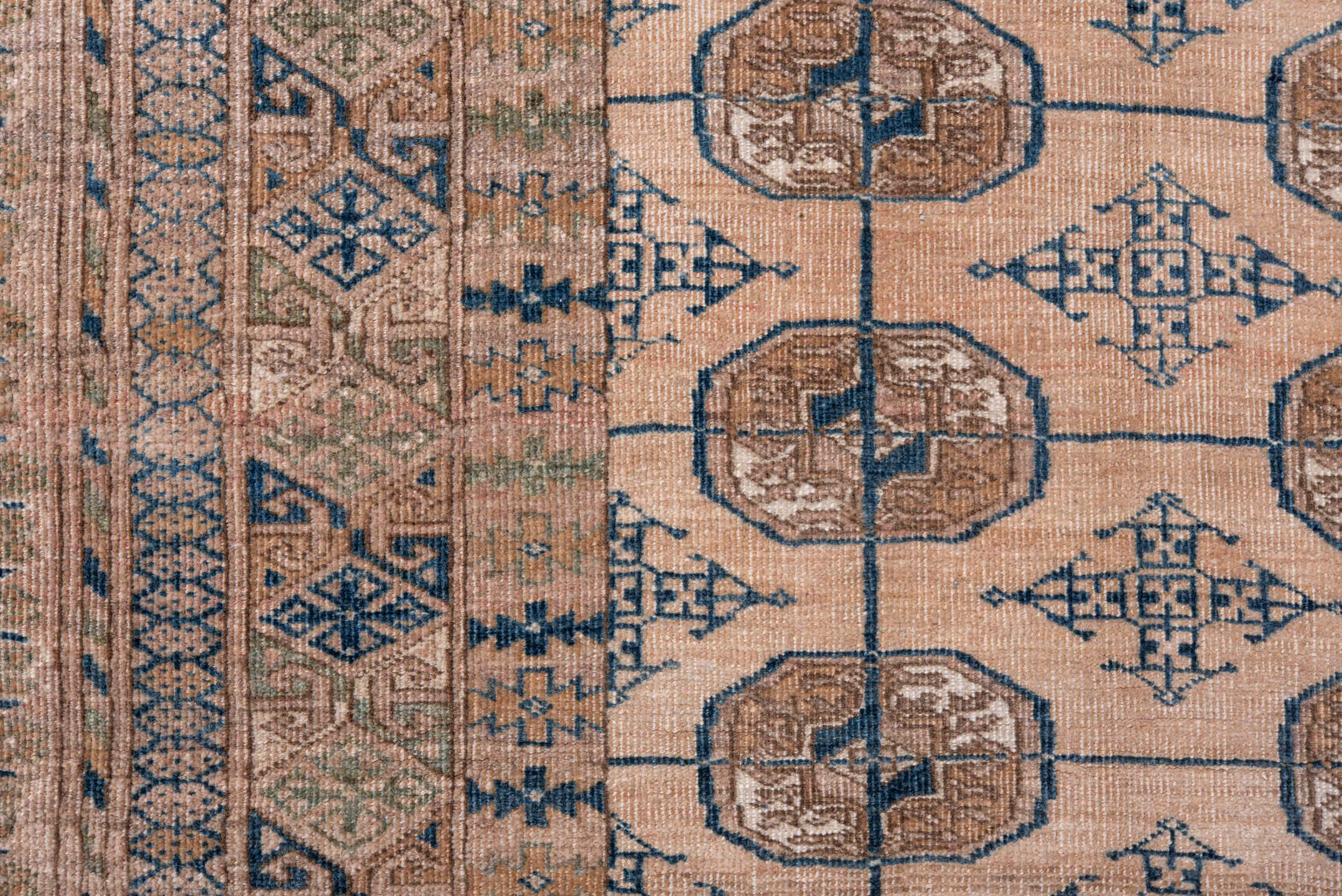 3' x 9' one-of-a-kind handmade antique Bokara runner rug. Color palette: taupe, dusty rose, slate, ivory, camel, brown