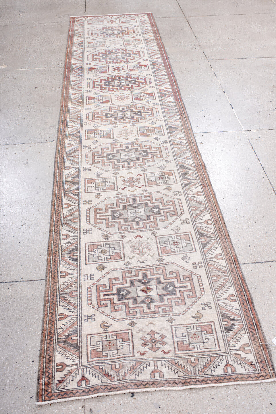 2' x 11' one-of-a-kind handmade antique Sivas runner rug. Color palette: ivory, rust, taupe, slate, rose, camel, terracotta