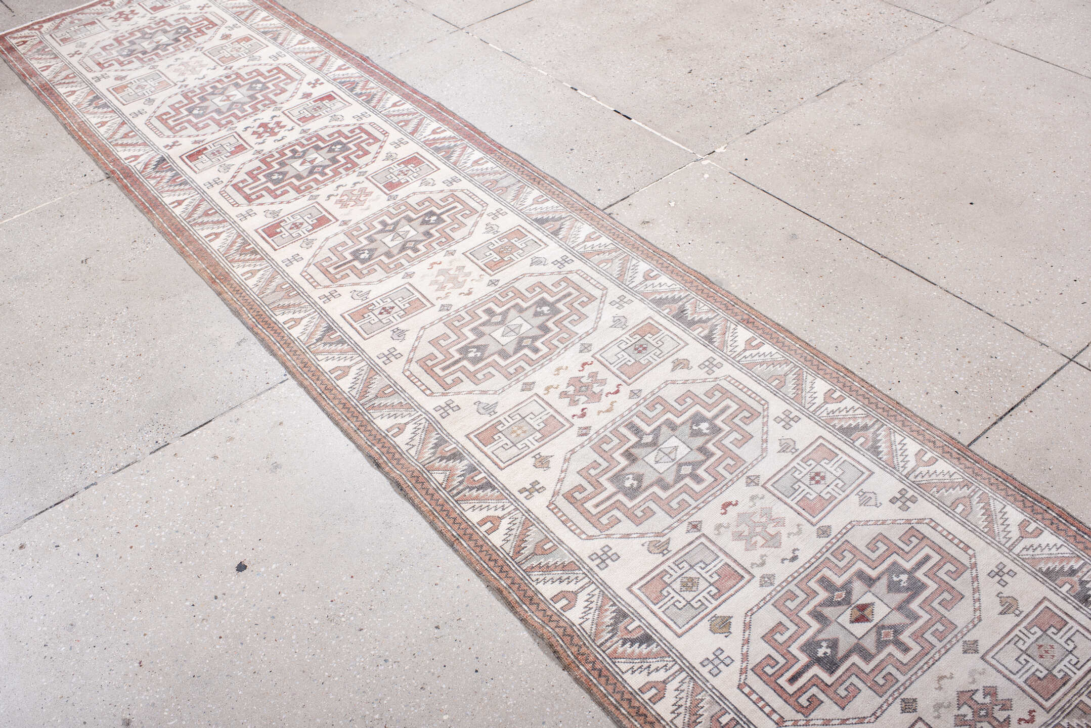2' x 11' one-of-a-kind handmade antique Sivas runner rug. Color palette: ivory, rust, taupe, slate, rose, camel, terracotta
