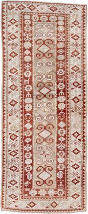 4' x 9' one-of-a-kind handmade antique Caucasian runner rug. Color palette: ivory, rust, camel, brick, beige, terracotta