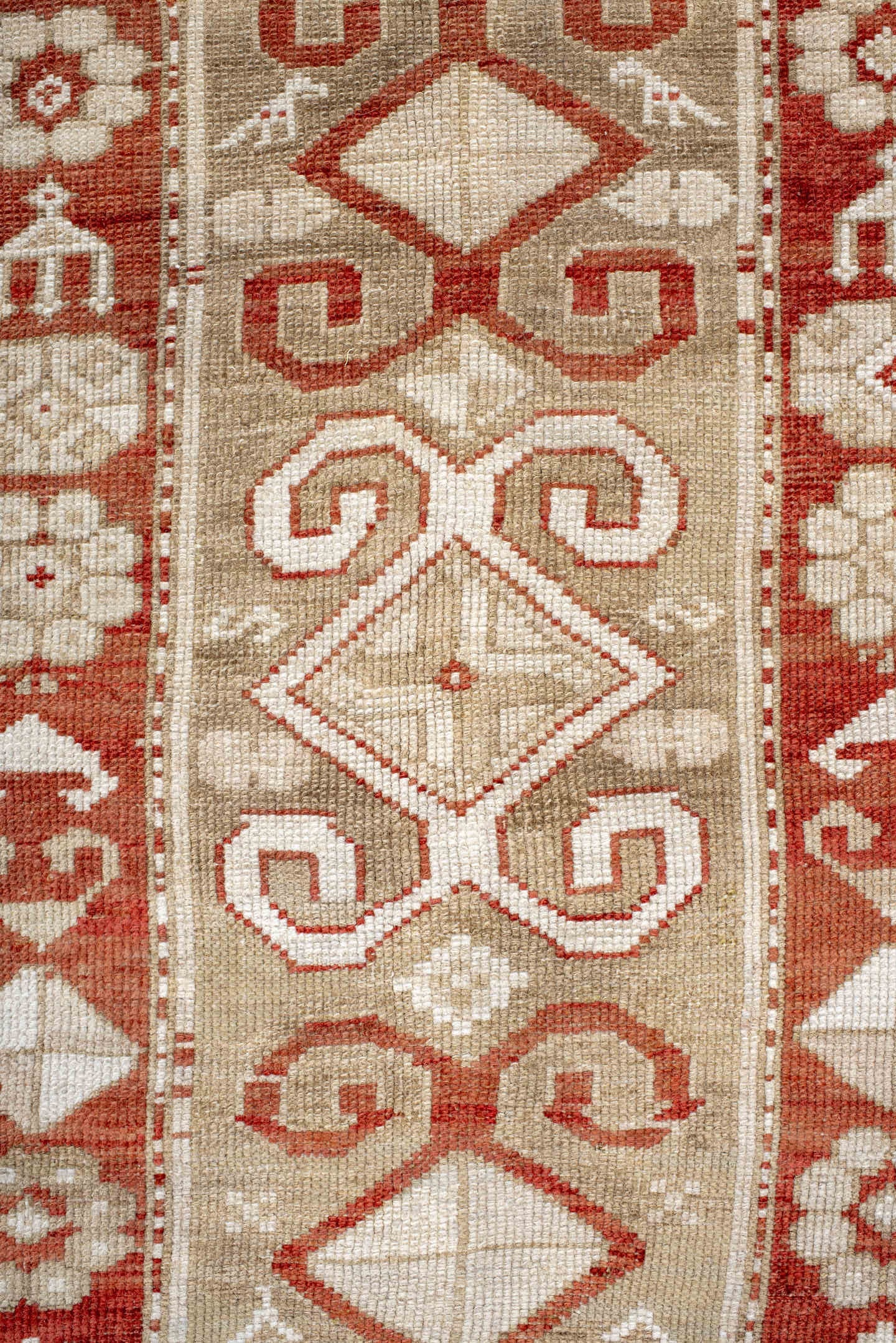 4' x 9' one-of-a-kind handmade antique Caucasian runner rug. Color palette: ivory, rust, camel, brick, beige, terracotta