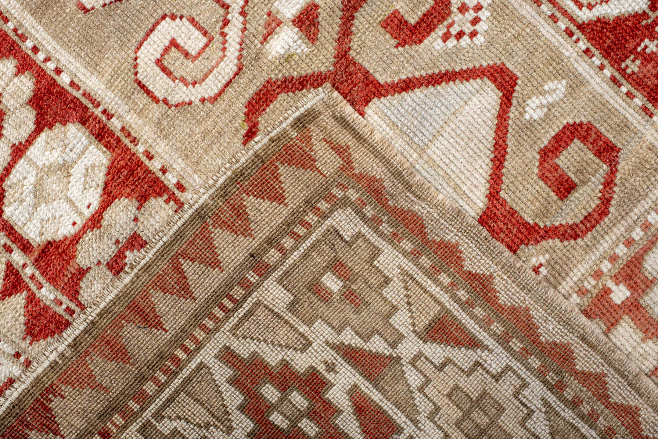 4' x 9' one-of-a-kind handmade antique Caucasian runner rug. Color palette: ivory, rust, camel, brick, beige, terracotta