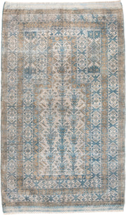 2' x 4' one-of-a-kind handmade antique Belouch small size rug. Color palette: ivory, sky blue, camel, taupe, sand