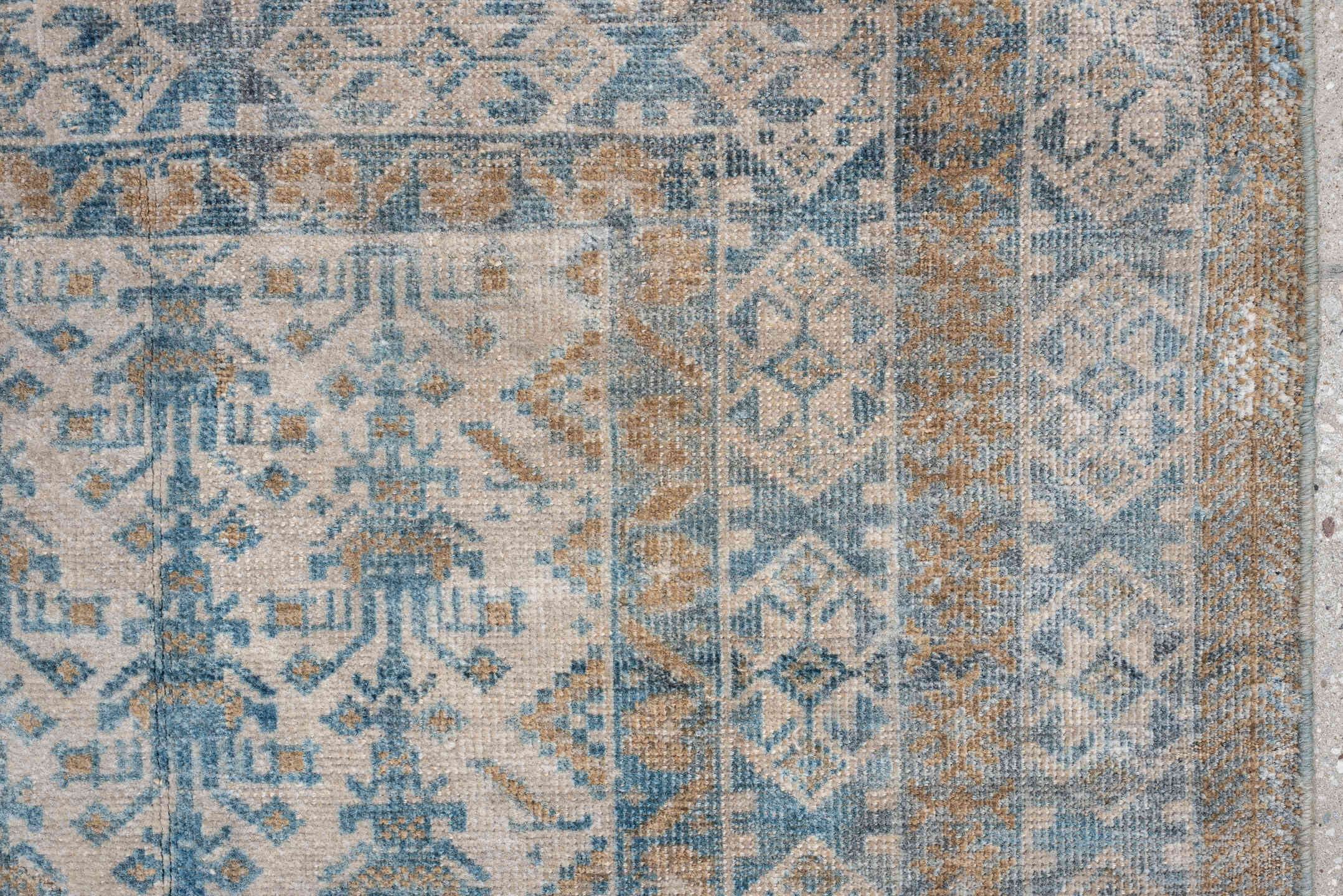 2' x 4' one-of-a-kind handmade antique Belouch small size rug. Color palette: ivory, sky blue, camel, taupe, sand