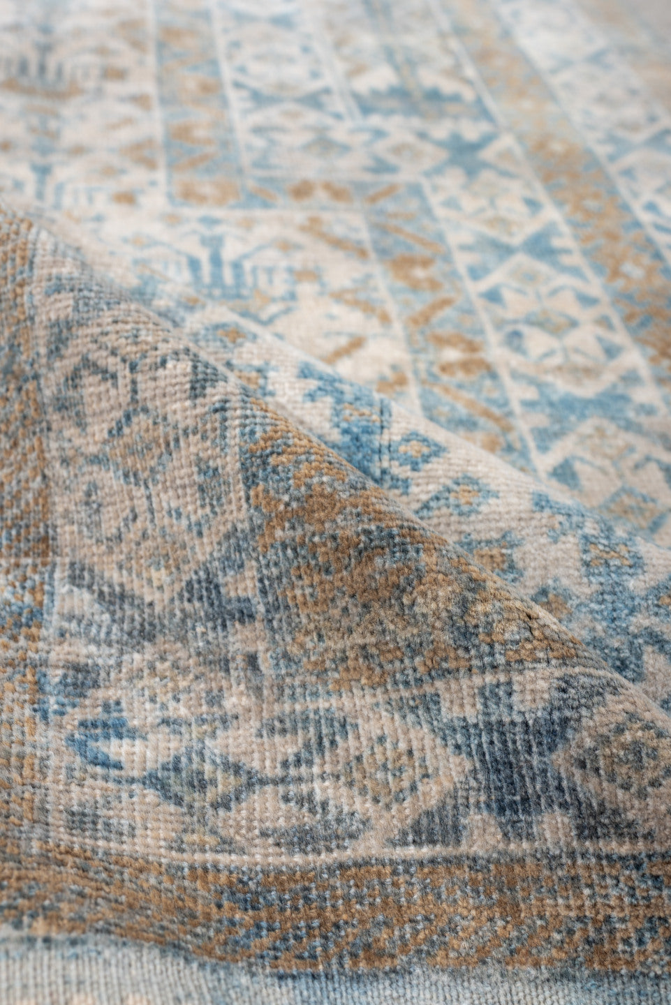 2' x 4' one-of-a-kind handmade antique Belouch small size rug. Color palette: ivory, sky blue, camel, taupe, sand