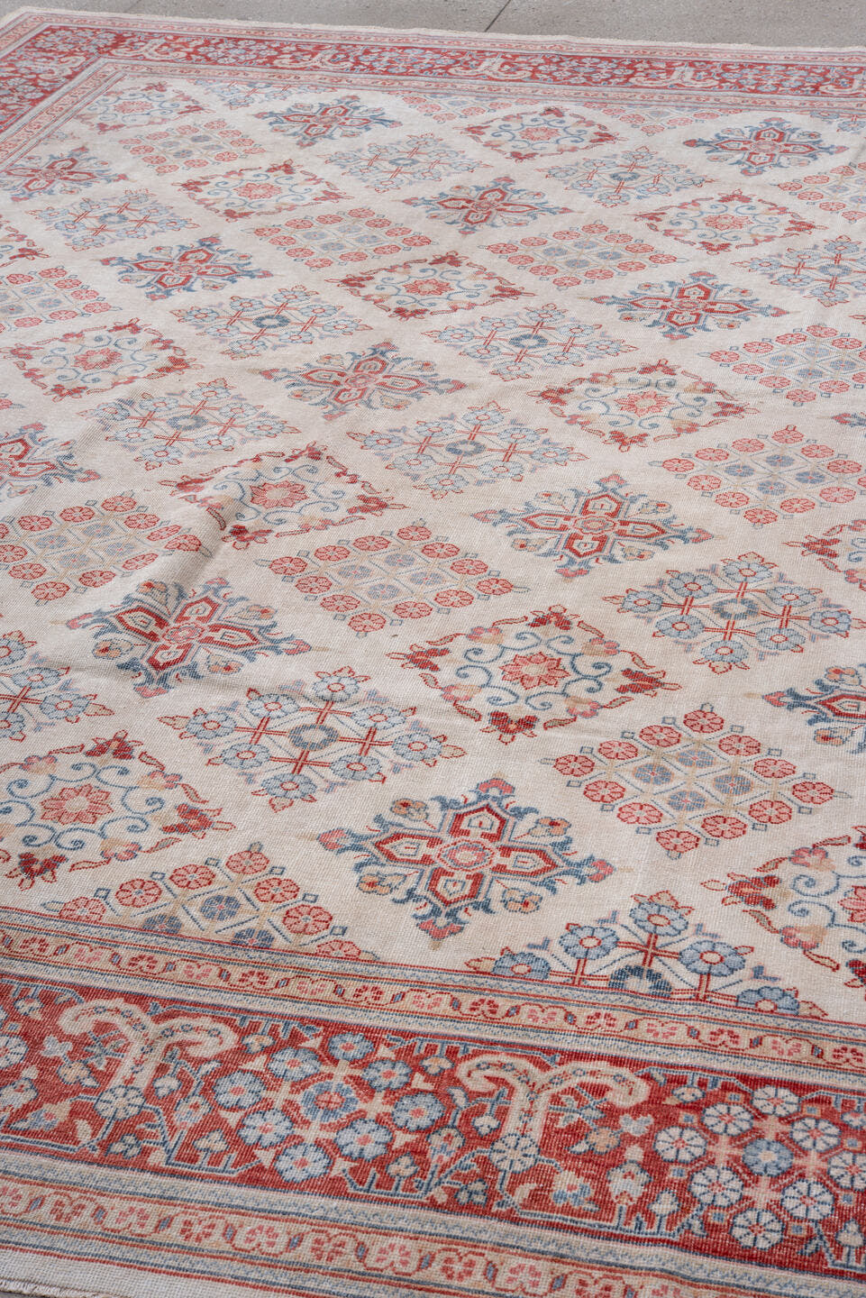 10' x 12' one-of-a-kind handmade vintage Joshegan large size rug. Color palette: ivory, rust, sky_blue, coral, brick