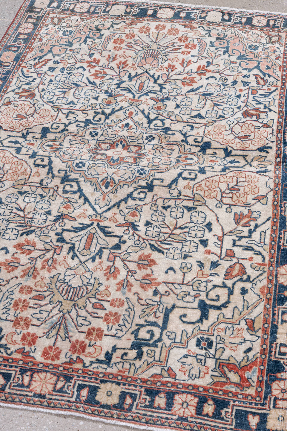 3' x 5' one-of-a-kind handmade antique Sarouk small size rug. Color palette: ivory, navy, coral, rust, slate, rose, blue