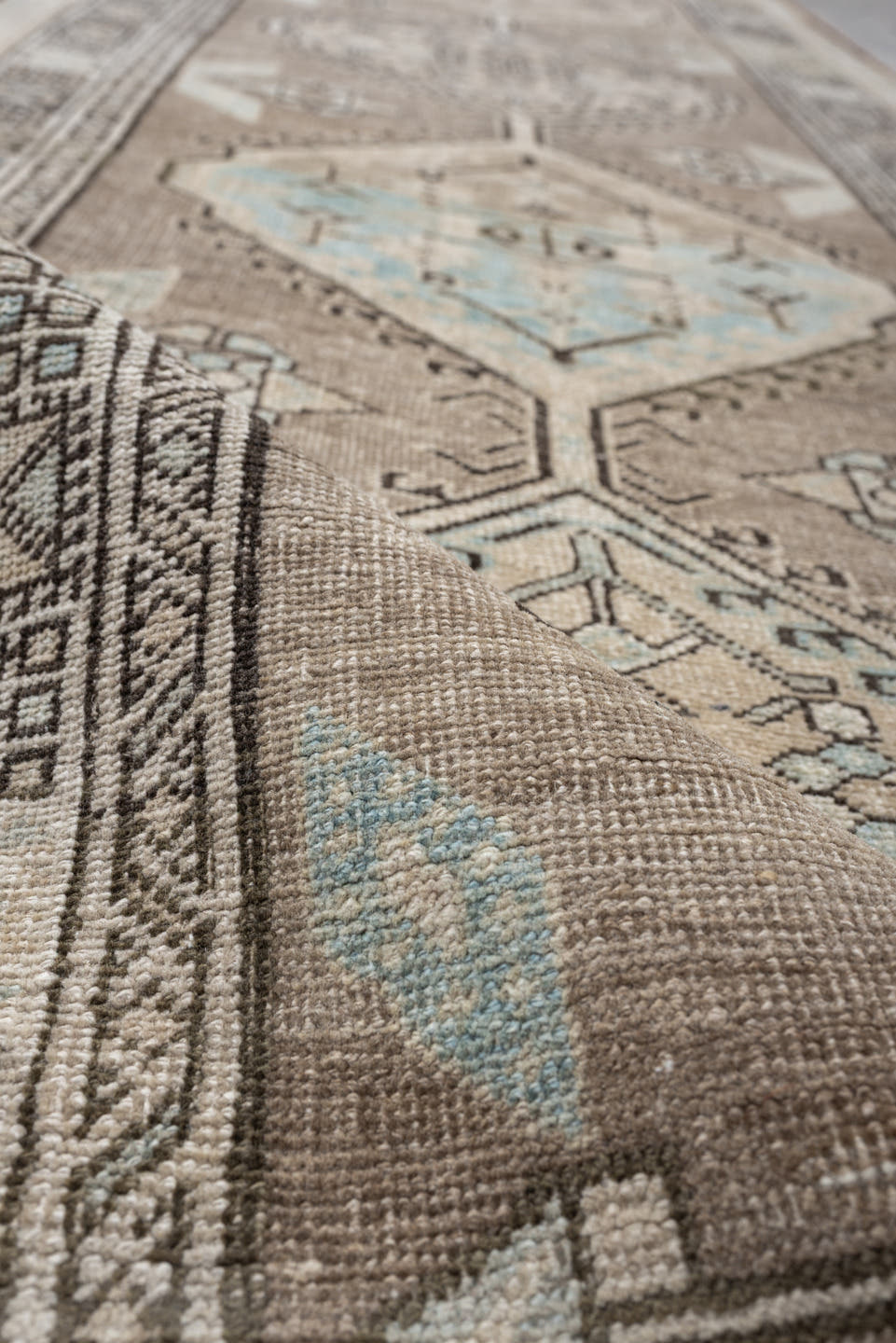 3' x 16' one-of-a-kind handmade vintage runner rug. Color palette: taupe, ivory, pale blue, camel, charcoal, beige, gray