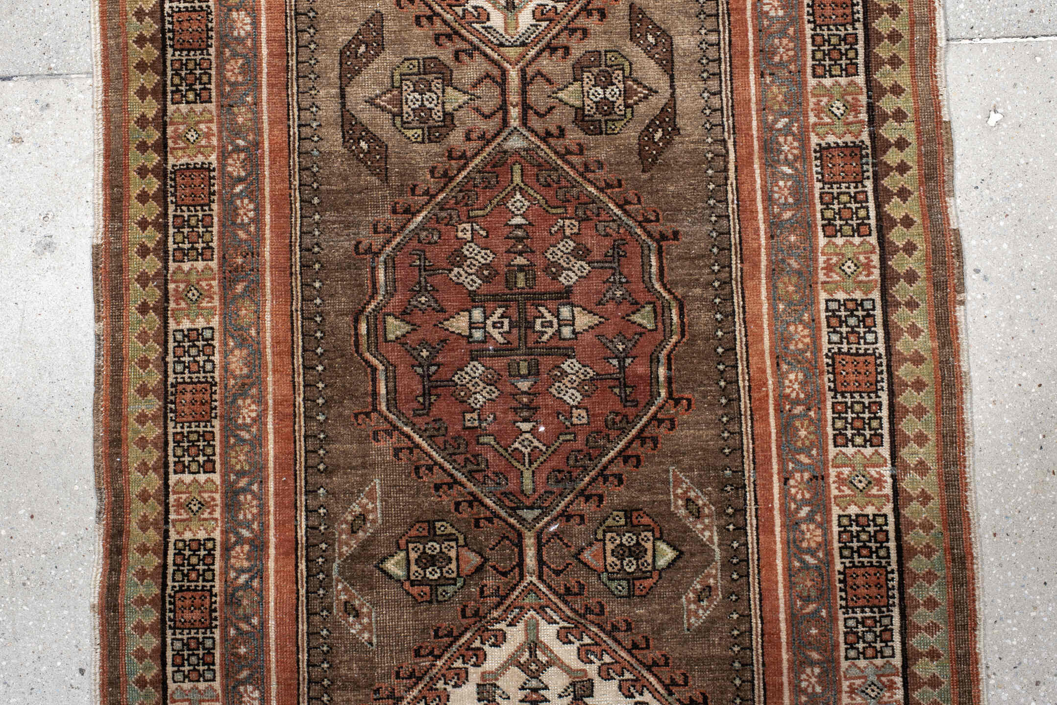 3' x 10' one-of-a-kind handmade antique Sarab runner rug. Color palette: taupe, camel, rust, ivory, brown, sage, slate