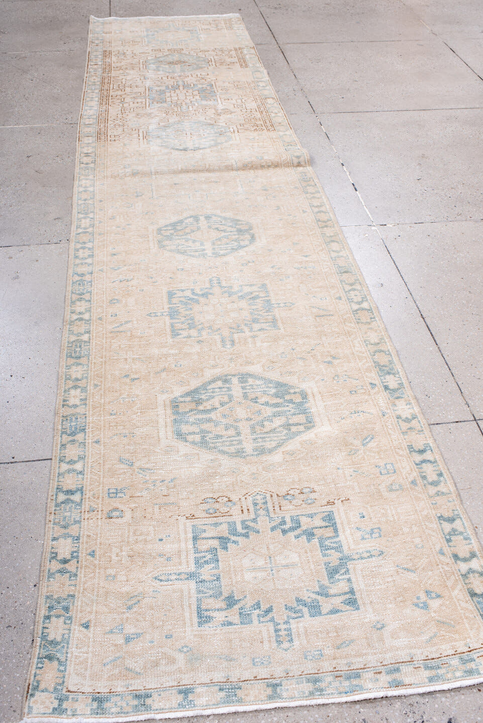 3' x 13' one-of-a-kind handmade antique Karaje runner rug. Color palette: ivory, pale blue, beige, taupe, camel, light brown
