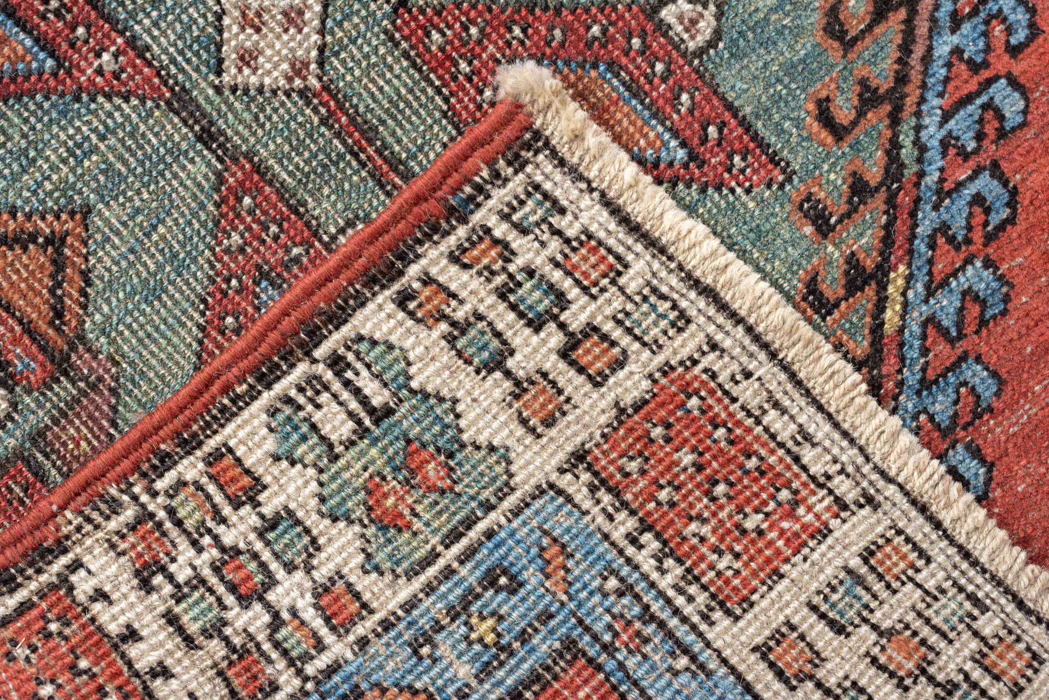 2' x 9' one-of-a-kind handmade vintage Saraband runner rug. Color palette: terra cotta, ivory, blue, rust, slate, sage