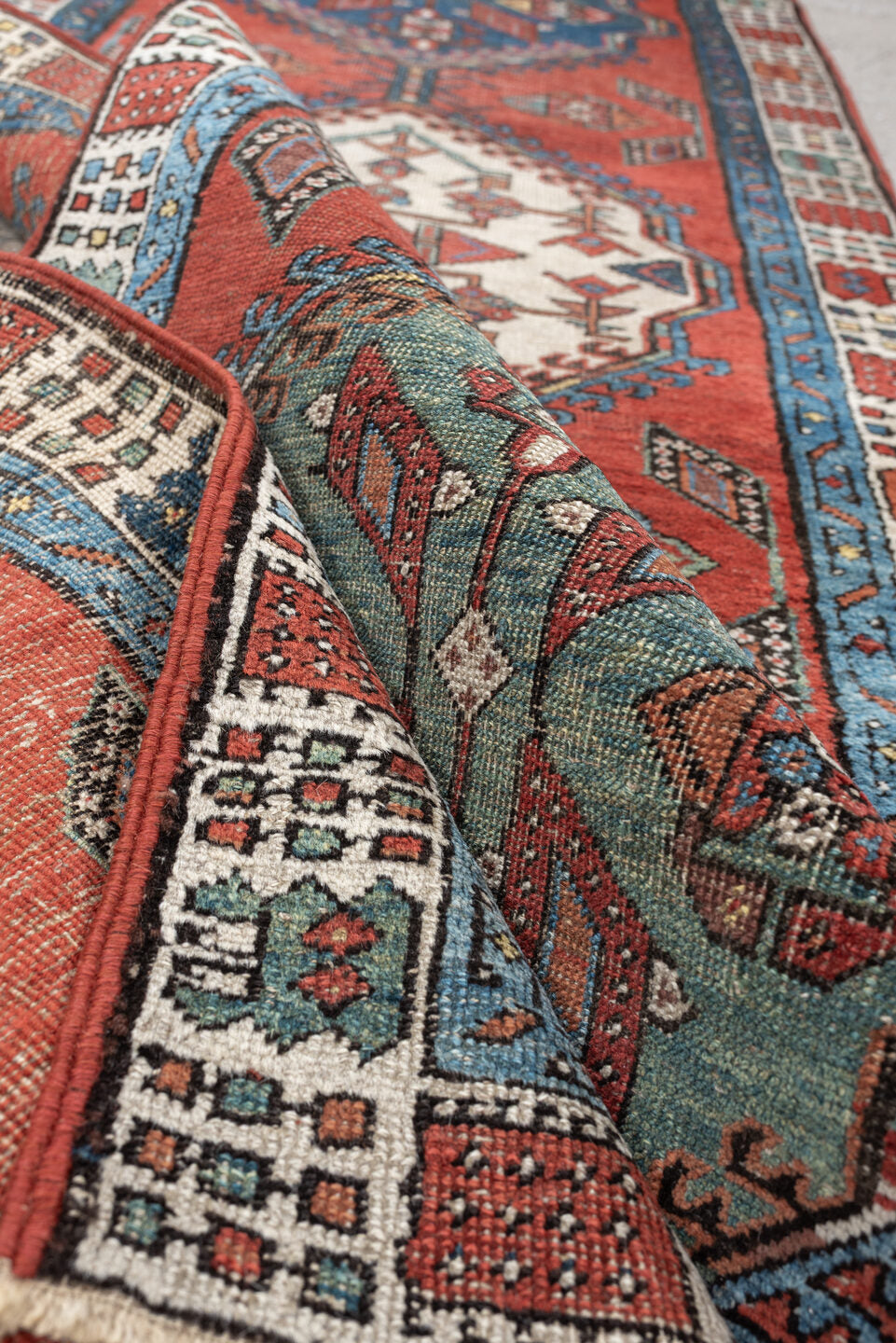 2' x 9' one-of-a-kind handmade vintage Saraband runner rug. Color palette: terra cotta, ivory, blue, rust, slate, sage