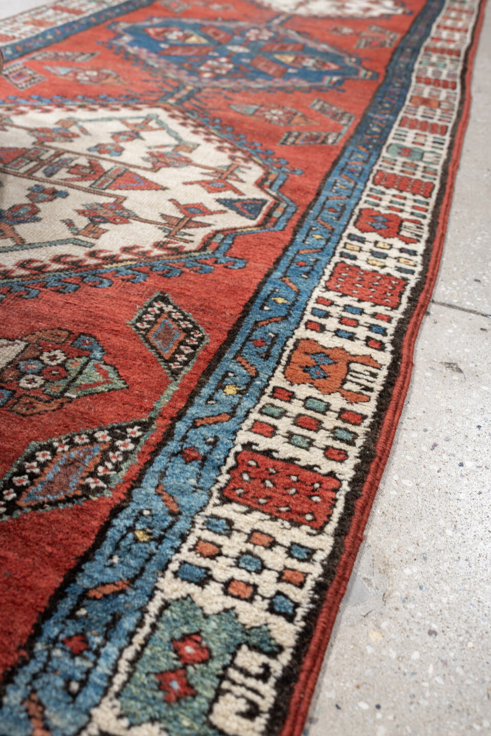 2' x 9' one-of-a-kind handmade vintage Saraband runner rug. Color palette: terra cotta, ivory, blue, rust, slate, sage