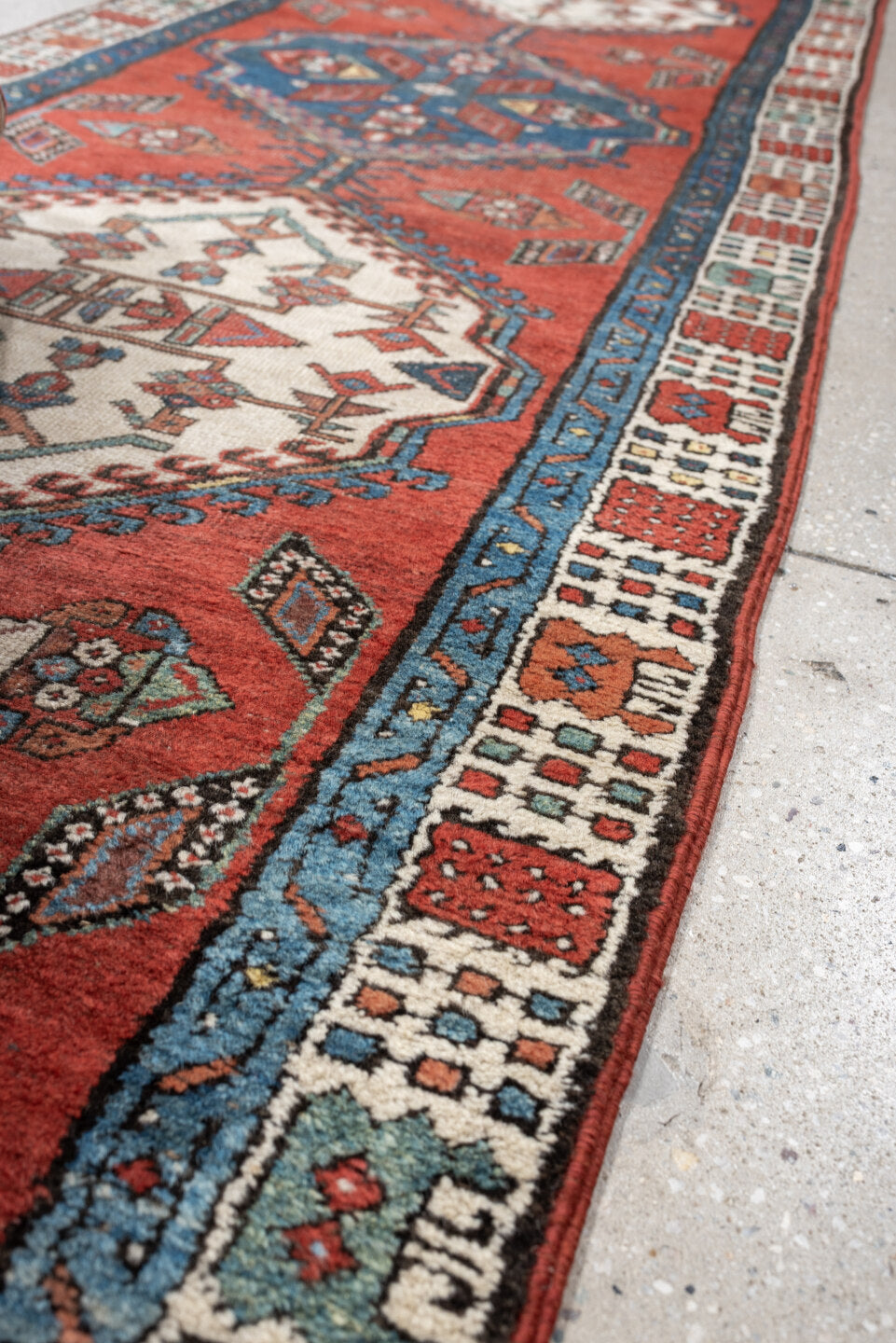 2' x 9' one-of-a-kind handmade vintage Saraband runner rug. Color palette: terra cotta, ivory, blue, rust, slate, sage