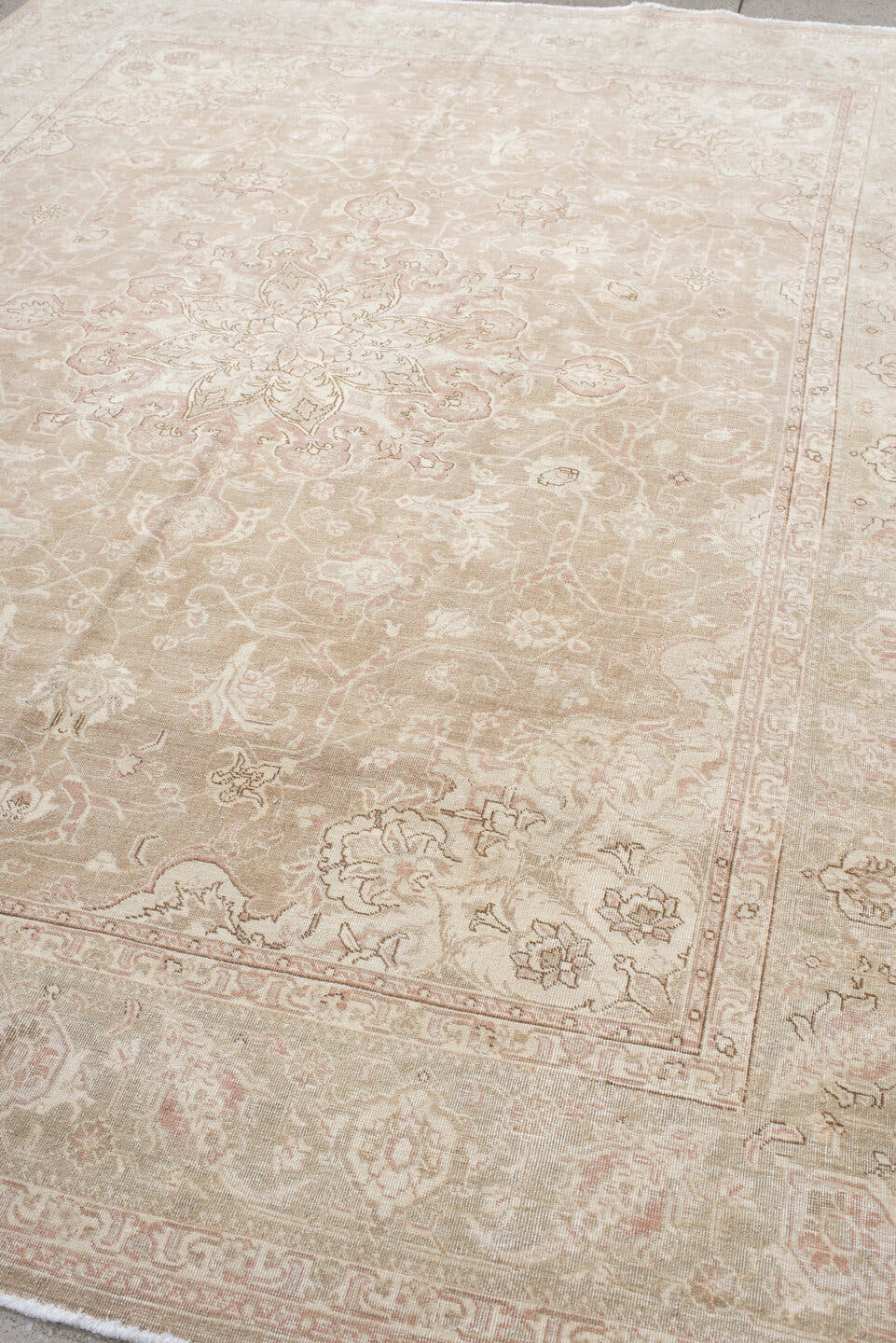 7' x 9' one-of-a-kind handmade vintage Tabriz rug. Color palette: ivory, blush, taupe, beige, sage, cream, pink, gray, green