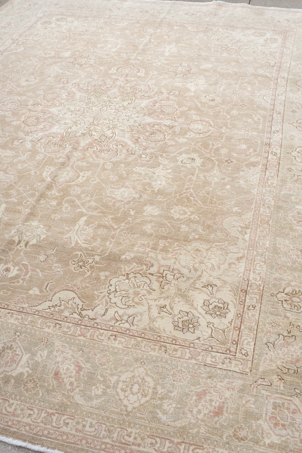7' x 9' one-of-a-kind handmade vintage Tabriz rug. Color palette: ivory, blush, taupe, beige, sage, cream, pink, gray, green