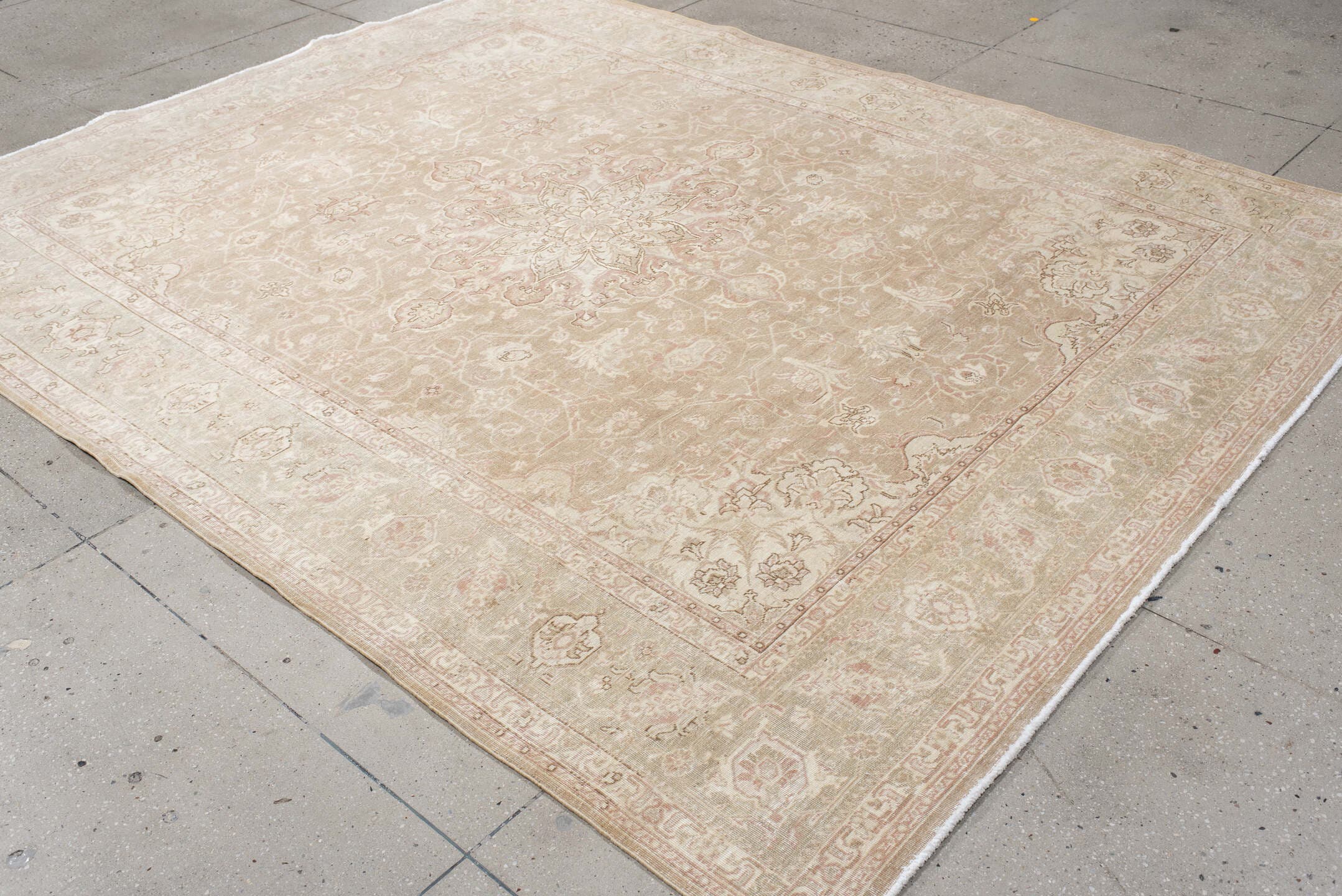 7' x 9' one-of-a-kind handmade vintage Tabriz rug. Color palette: ivory, blush, taupe, beige, sage, cream, pink, gray, green