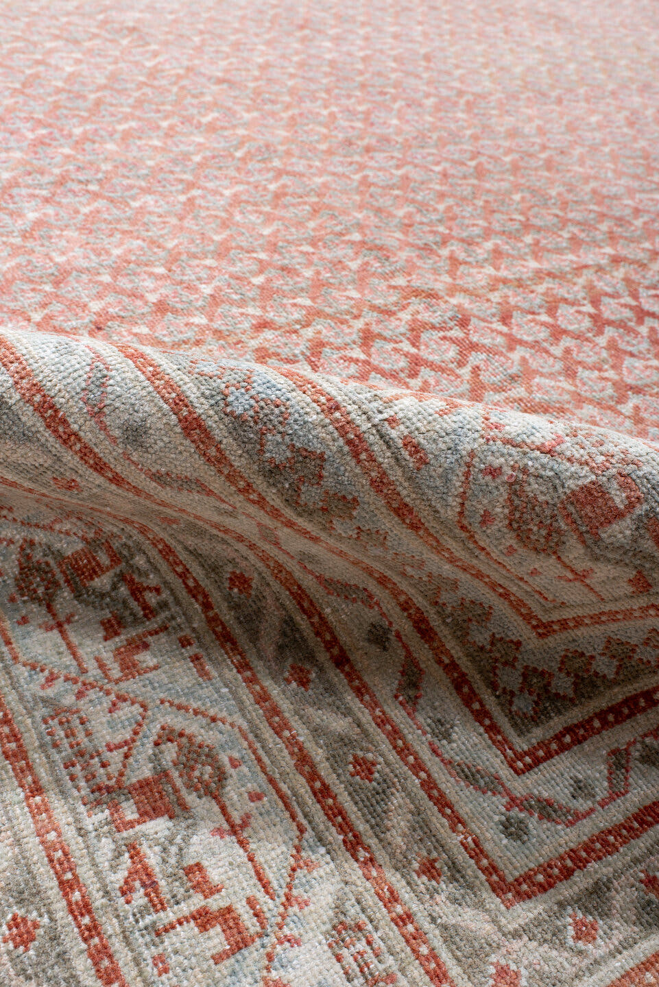 8' x 12' one-of-a-kind handmade antique Saraband large size rug. Color palette: terra cotta, ivory, rose, taupe, rust