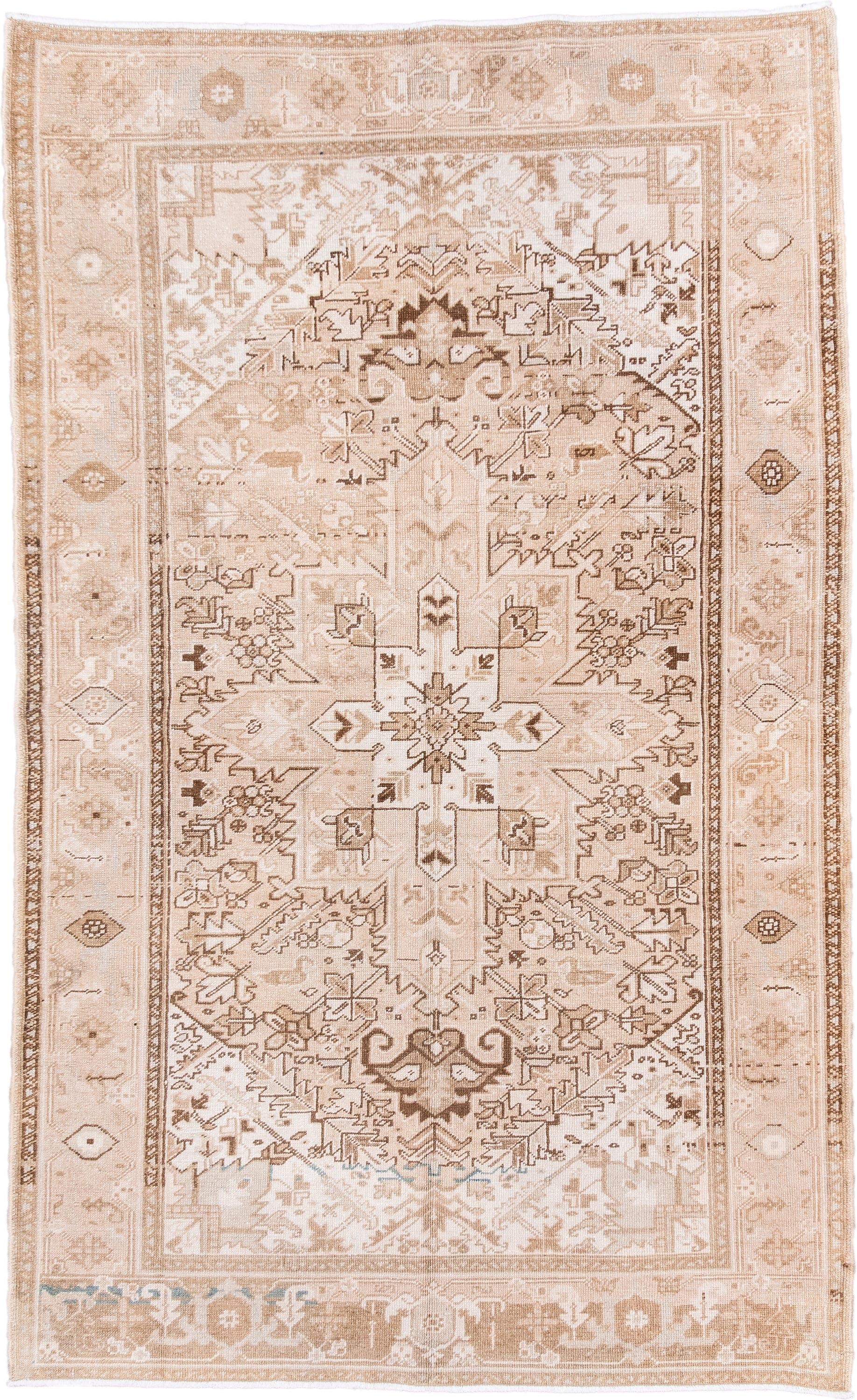 4' x 7' one-of-a-kind handmade antique Heriz rug. Color palette: ivory, blush, camel, taupe, beige, brown, pale blue, pink