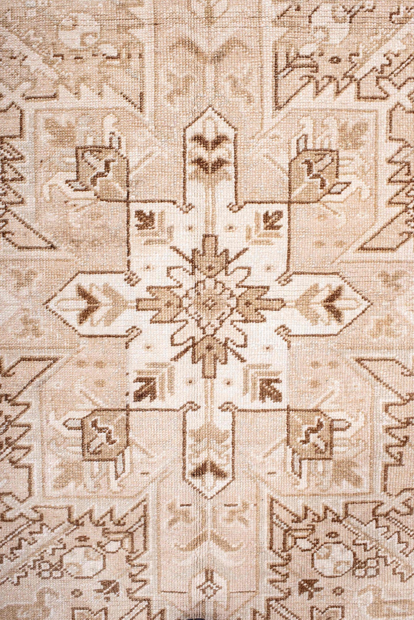 4' x 7' one-of-a-kind handmade antique Heriz rug. Color palette: ivory, blush, camel, taupe, beige, brown, pale blue, pink