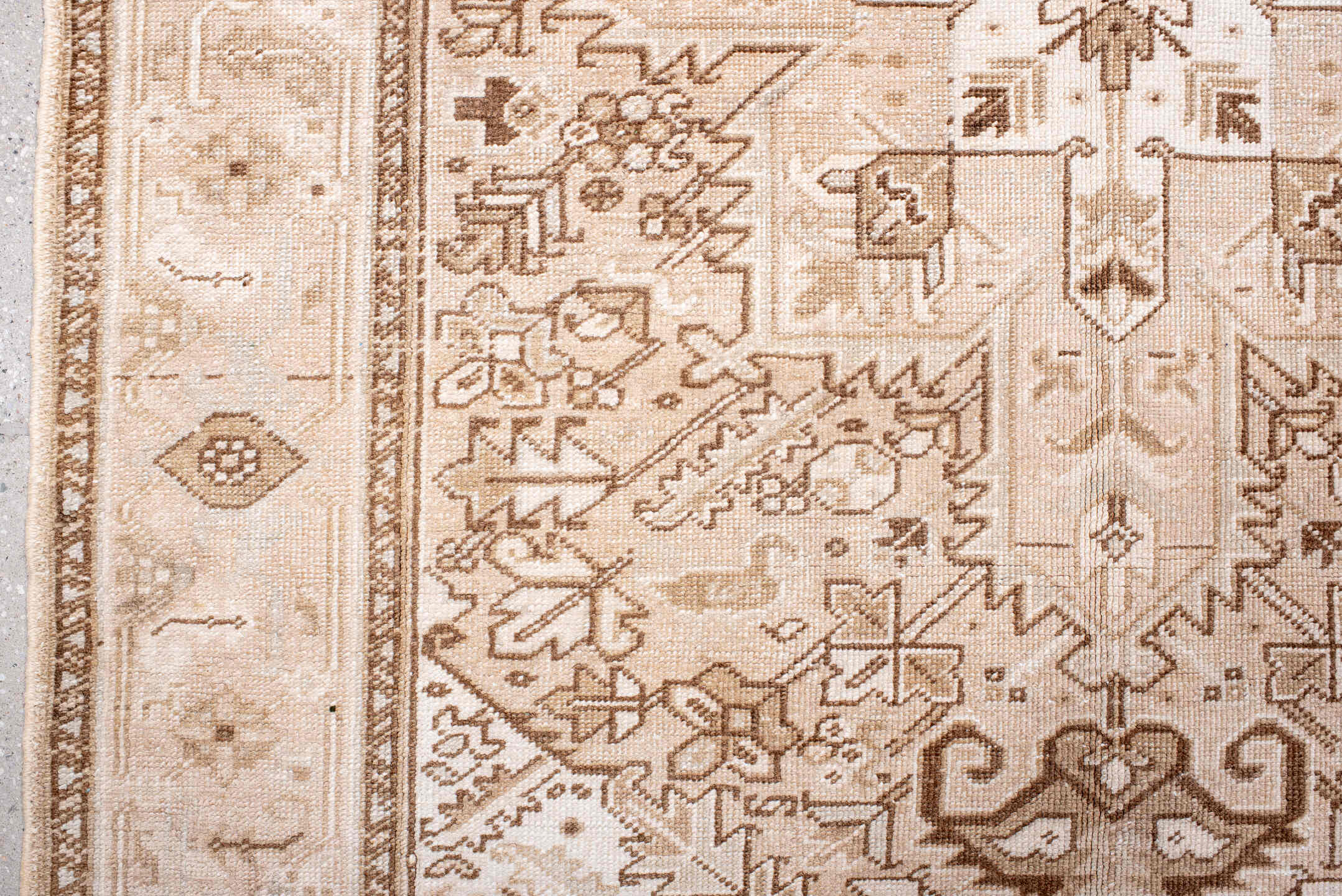4' x 7' one-of-a-kind handmade antique Heriz rug. Color palette: ivory, blush, camel, taupe, beige, brown, pale blue, pink