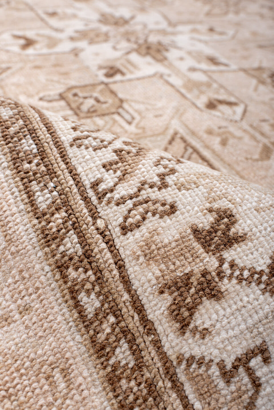 4' x 7' one-of-a-kind handmade antique Heriz rug. Color palette: ivory, blush, camel, taupe, beige, brown, pale blue, pink